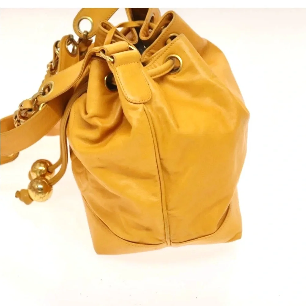 Authentic CHANEL yellow lambskin bucket bag with wallet pouch